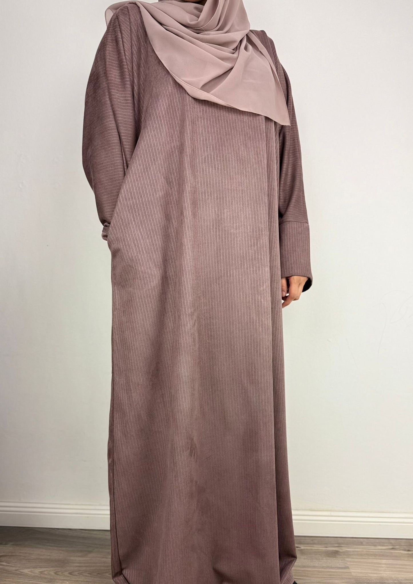 Abaya Imani.