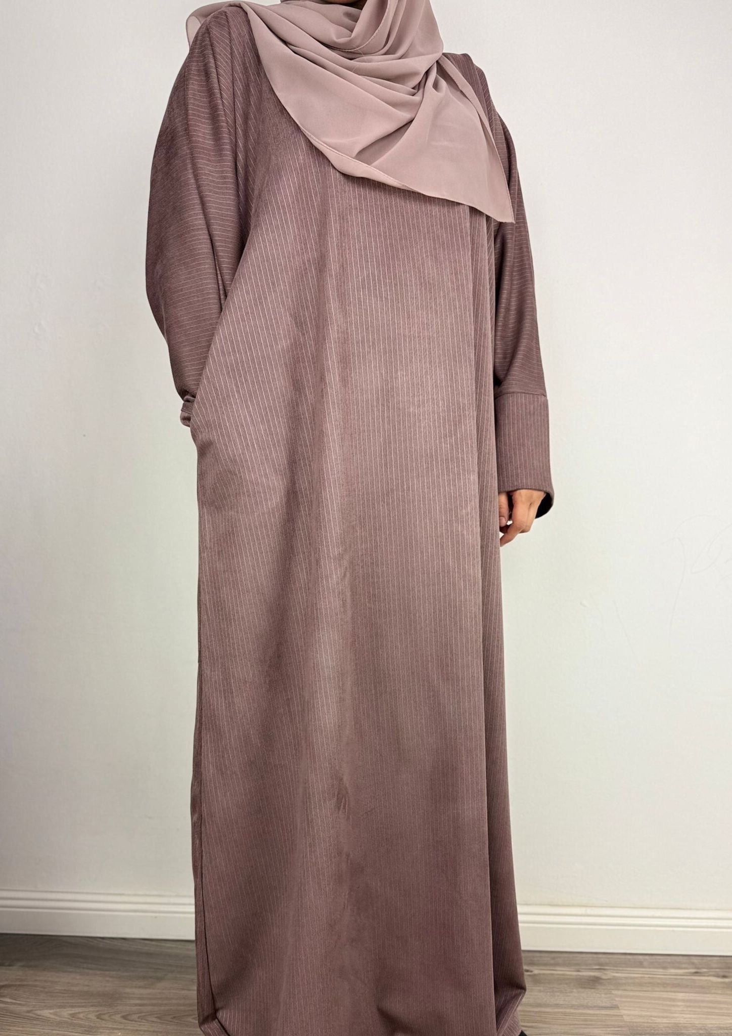 Abaya Imani.