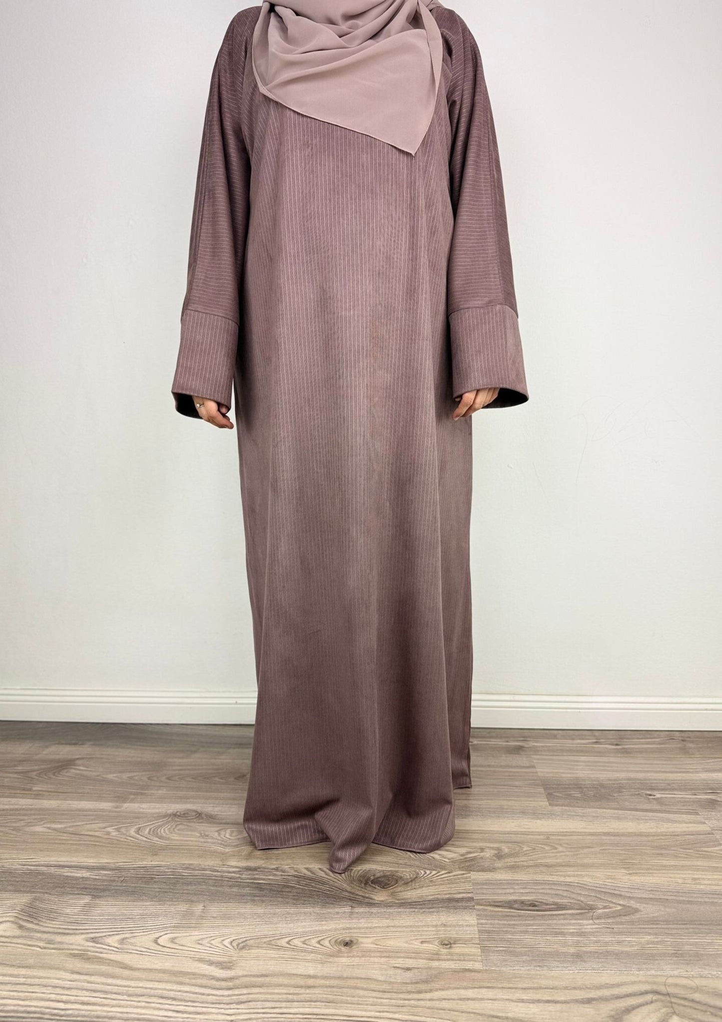 Abaya Imani.