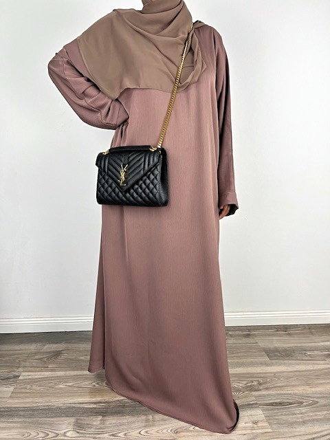 Abaya Nur.